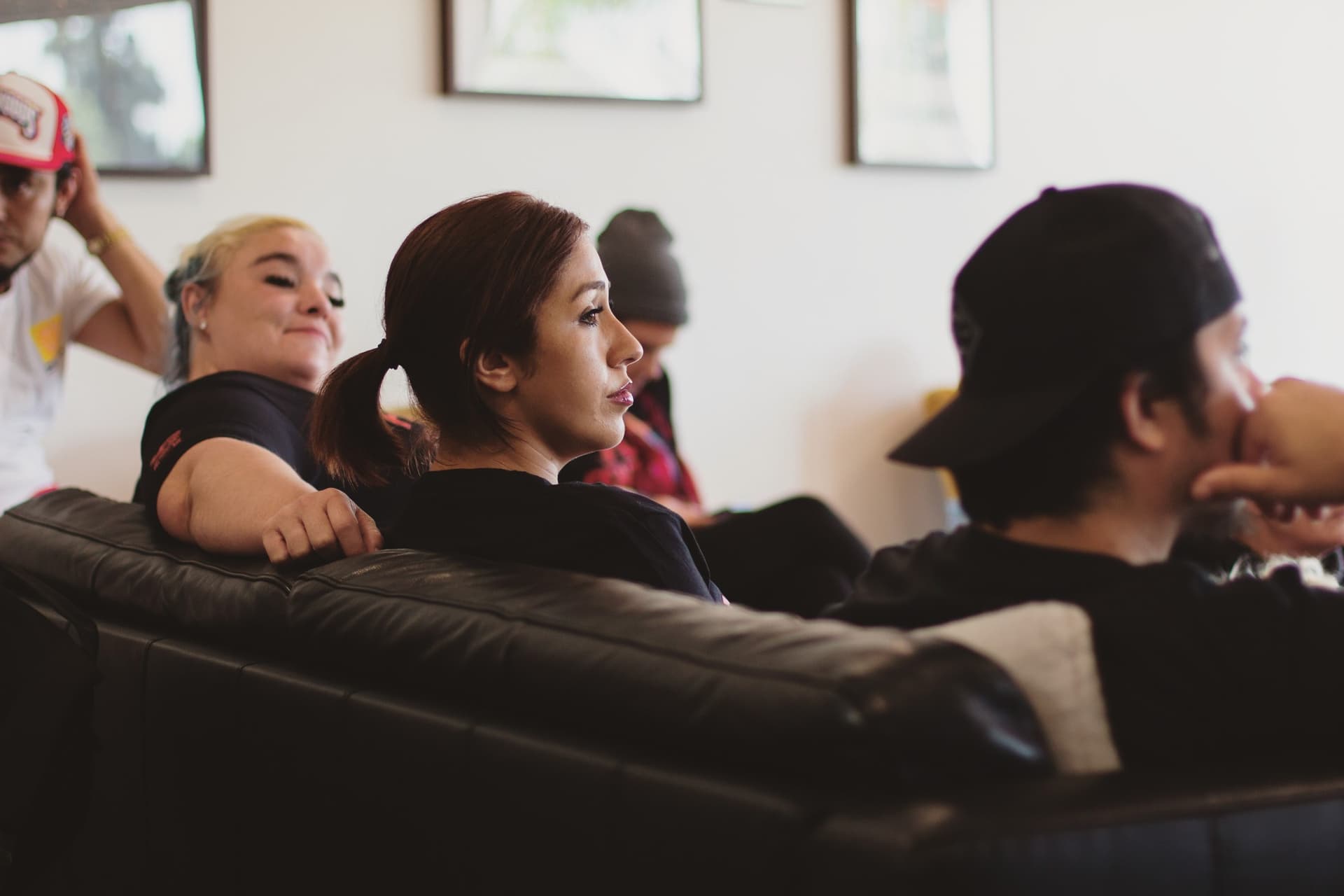 Clients listening intently to a group session.